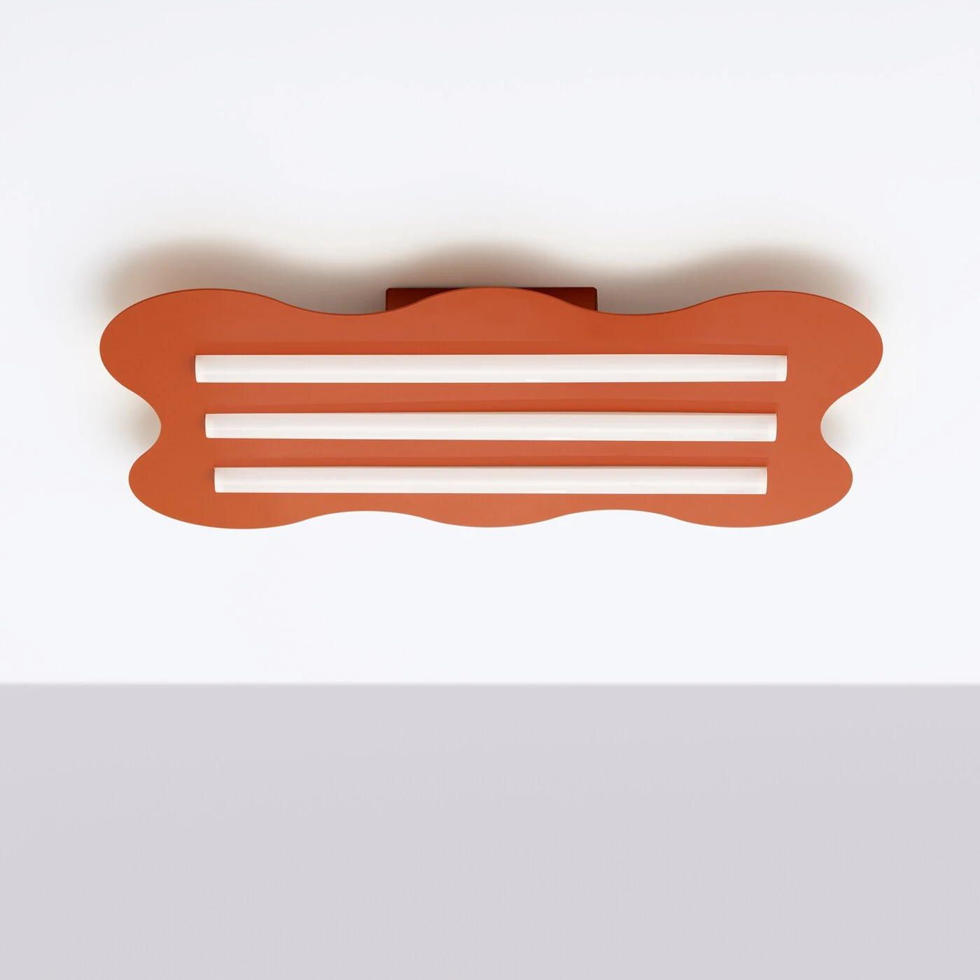 Ceiling lamp 66 cm – wavy form, red ochre, 3x S14d