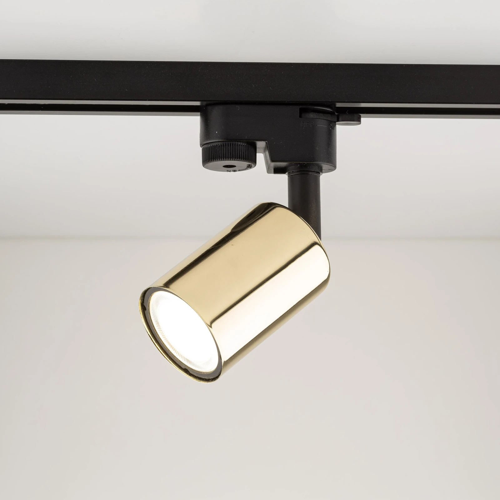 GU10 track spotlight – cylindrical, black and gold, adjustable