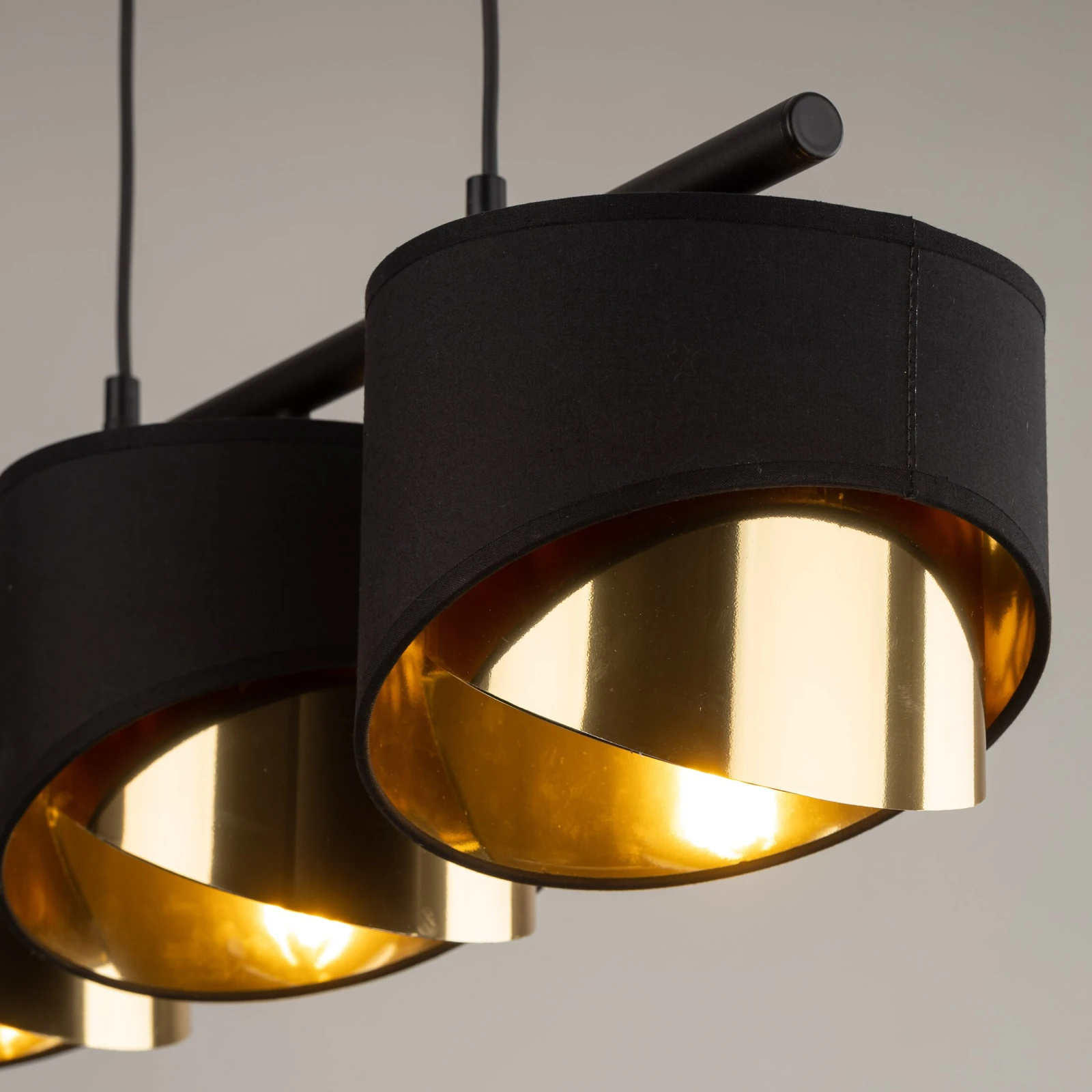 3xE27 pendant light – linear black frame, gold inner shades